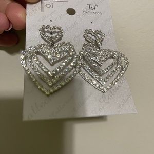 Brand new Toi Collection heart clear rhinestone earrings